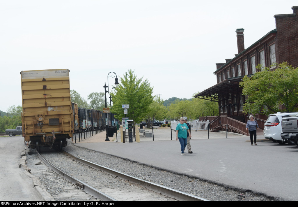 The rear of NS yard job E19 passes by the Depot Grille restaurant, THE place to go to enjoy food and, if your timing is right, some RAIL ACTION